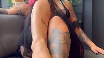Aroused Girl With Tattoos Displaying Her Physique
