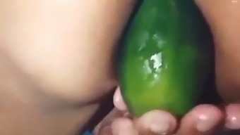 Stepmom Flaunts Her Open Ass While Using A Large Cucumber For Pleasure