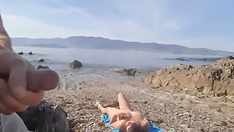 A Daring Exhibitionist Pleases A Nudist Milf With His Erection On The Beach